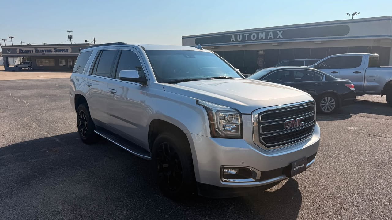 A GMC Yukon parked at the Automax lot in Sherman.